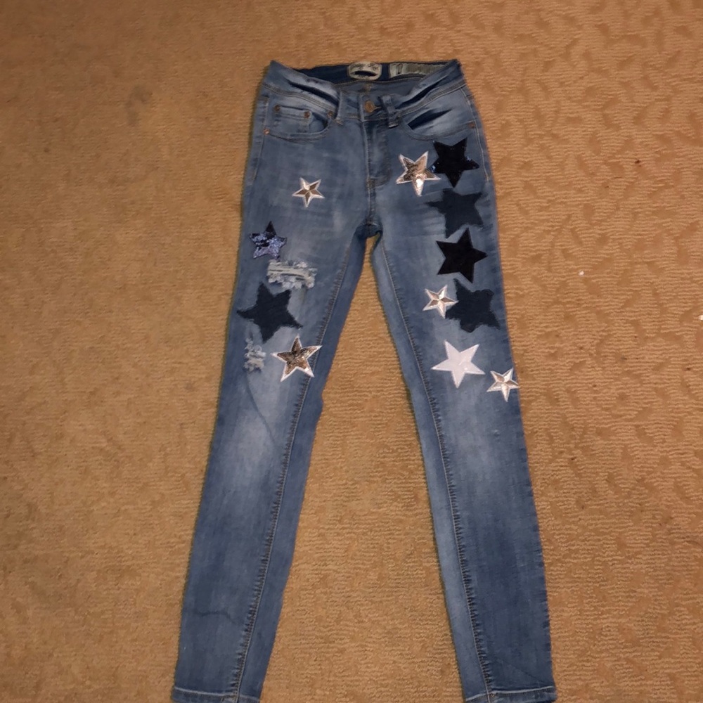 Ripped jeans with starts